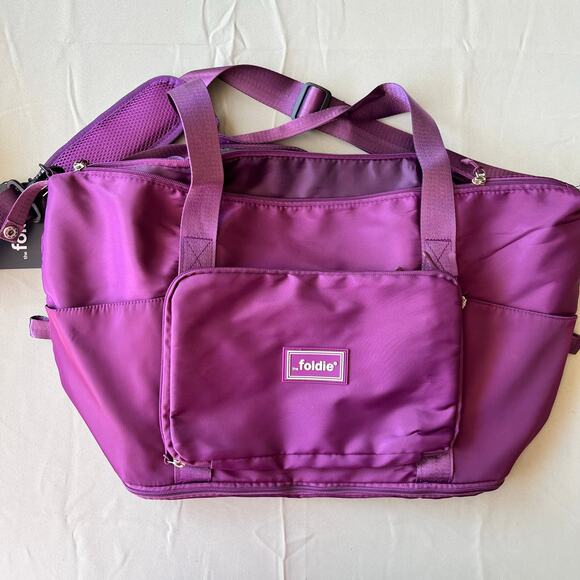NWT The Foldie Travel Bag Foldable Purple Lightweight Large Duffel or Carry-On - Picture 1 of 12